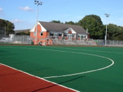 Coloured sand for sports pitches